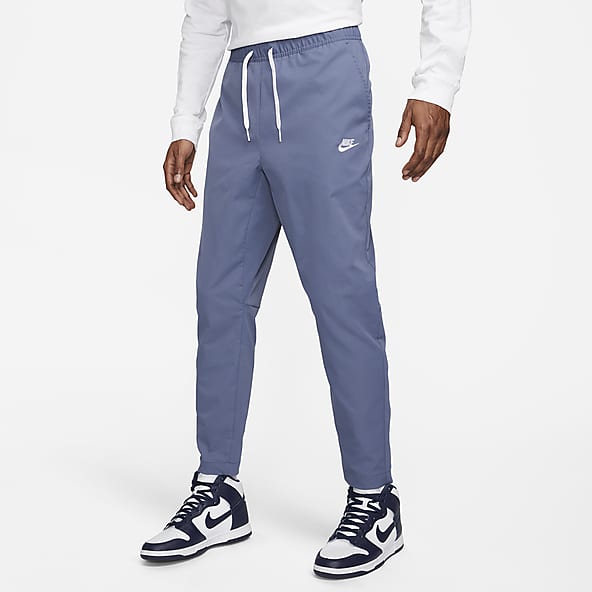 Blue sports trousers for men and women with logo embroidery - NIKE