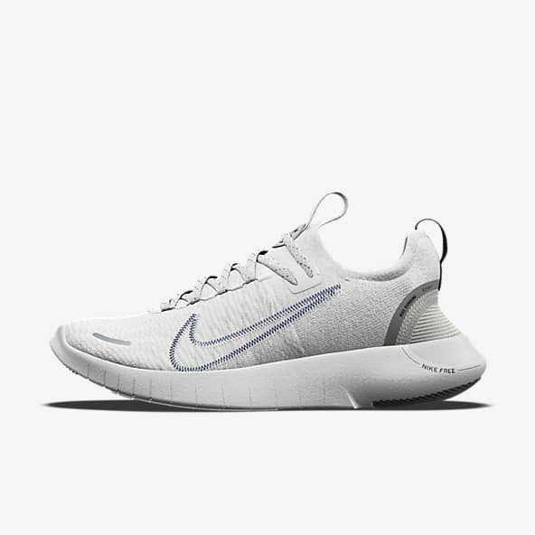 WeiB Nike Free RN Running Schuhe. Nike LU
