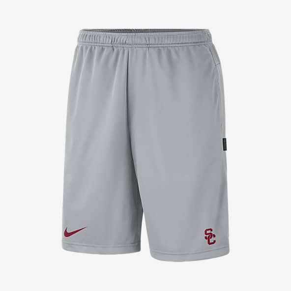 red nike football shorts