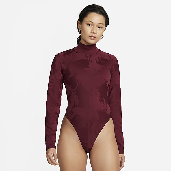 https://static.nike.com/a/images/c_limit,w_592,f_auto/t_product_v1/c742f6fd-0394-4c19-ab7d-e8f8b798545a/sportswear-tech-pack-bodysuit-ZbDRvx.png