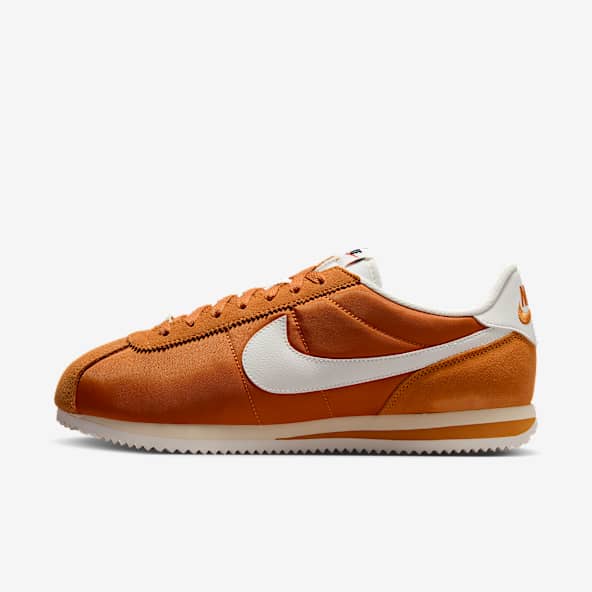 orange and white nike cortez