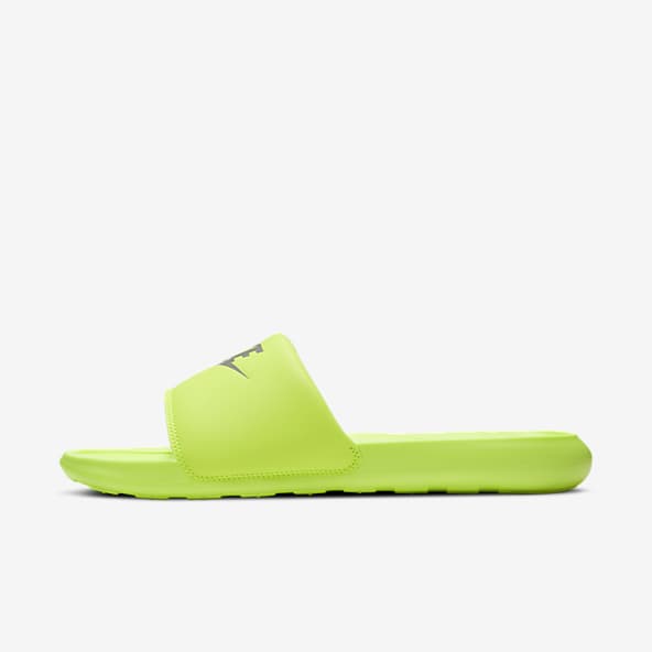 yellow nike slippers