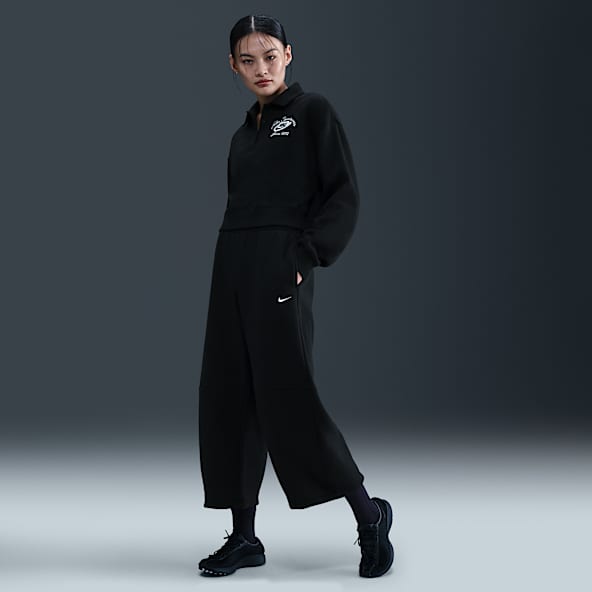 Nike Sportswear Phoenix Fleece Pantalones entubados de tiro medio holgados para mujer