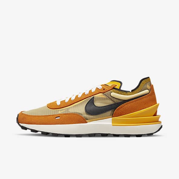 nike black and yellow shoes