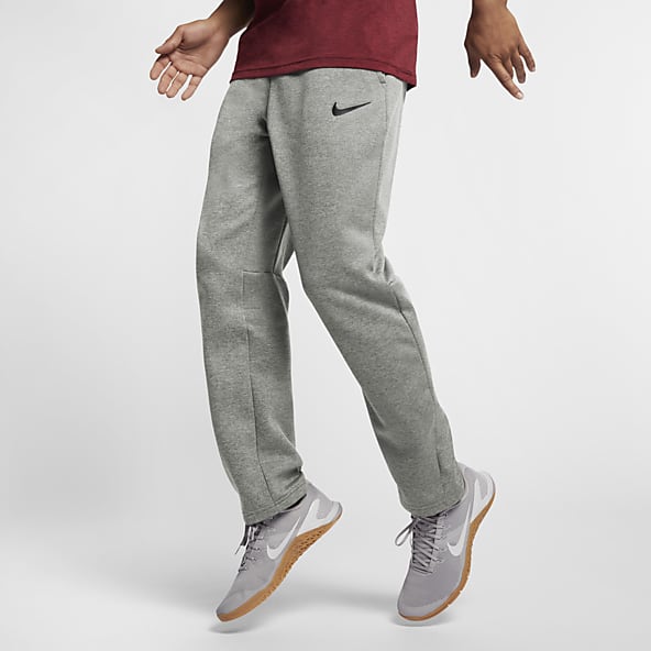nike therma track pants