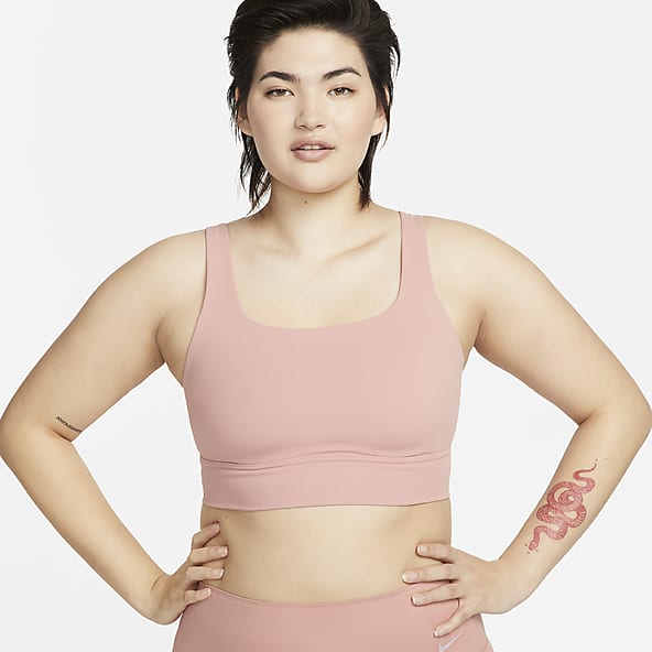 Nike Training Indy light support mesh cut out sports bra in pink