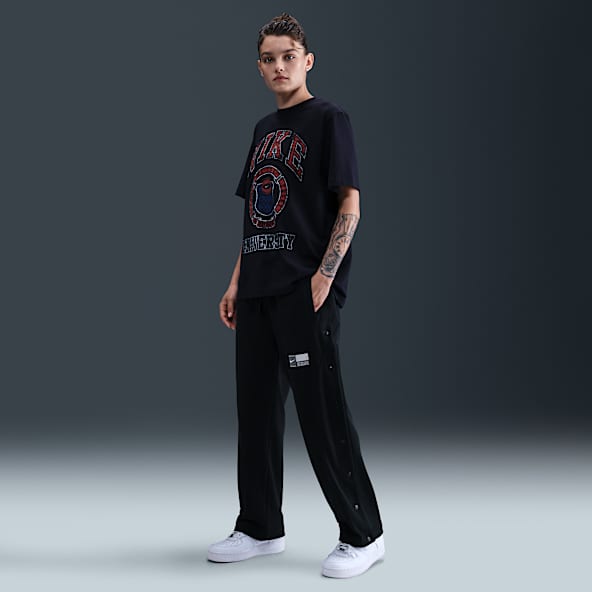 Nike Pantalón de básquetbol de apertura lateral de tejido Fleece - Mujer