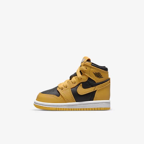 black and yellow infant jordans
