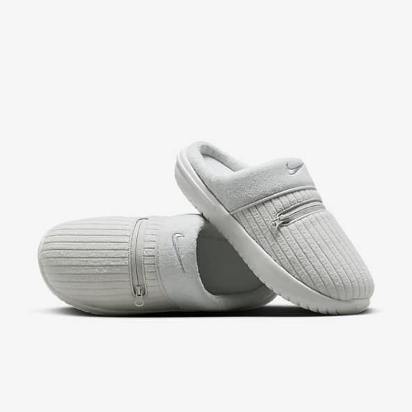 Grey nike 2025 slip ons