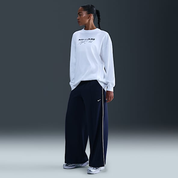 Nike Sportswear Pants de entrenamiento de tiro medio y pierna amplia para mujer