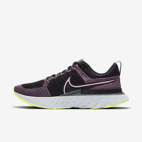 nike running free run flyknit trainers in grey and pink