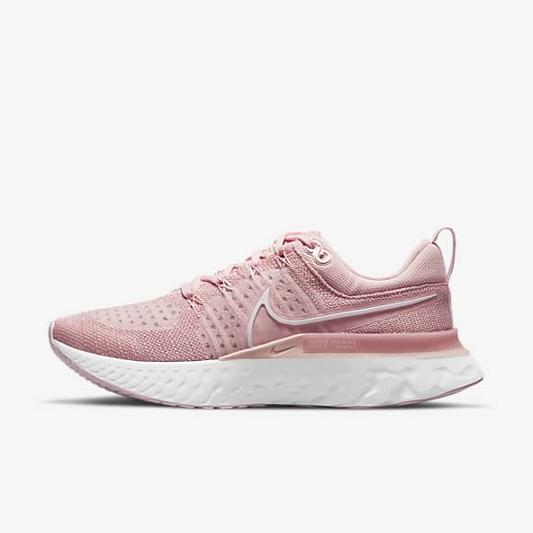 nike pink flyknit shoes