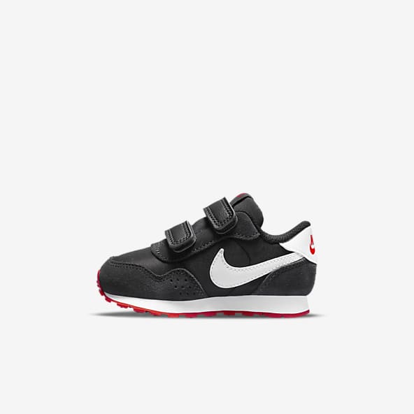 Zapatillas negras para niños/as. Nike