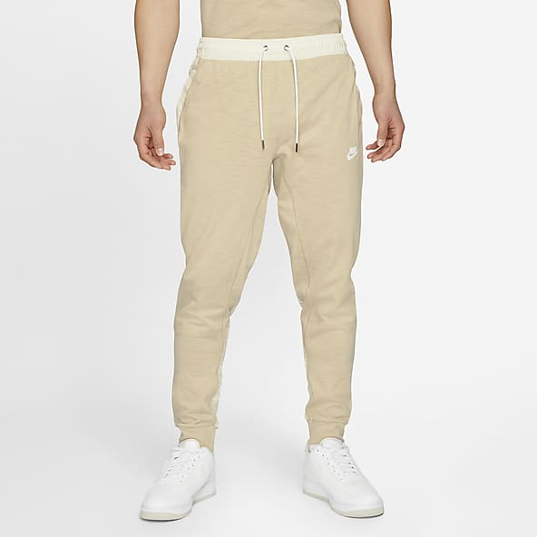 beige nike tracksuit mens