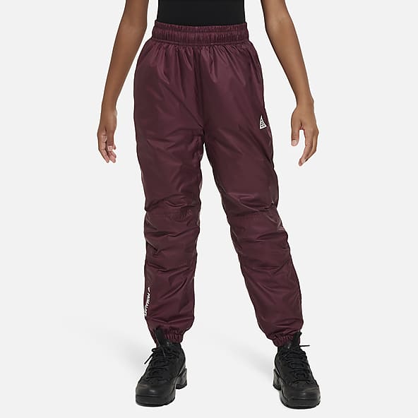 Nike Therma-FIT Big Kids' (Girls') Cuffed Pants (Extended Size).