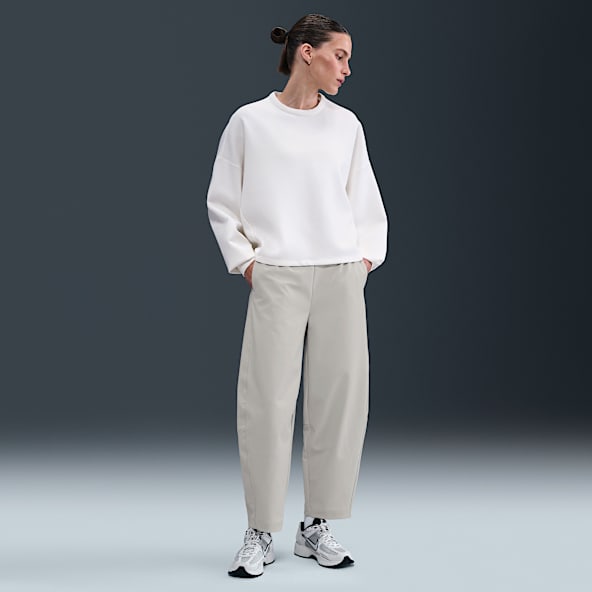 Nike 24.7 PerfectStretch Pants Dri-FIT de tiro alto de pierna holgada y tipo barril para mujer
