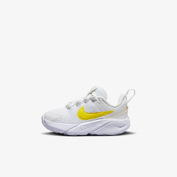 Gold nike 2024 baby shoes