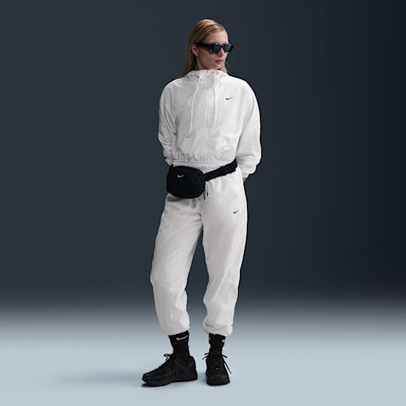 Nike Sportswear Classic Wovens Pantalon de jogging ample taille mi-haute avec protection UV pour femme