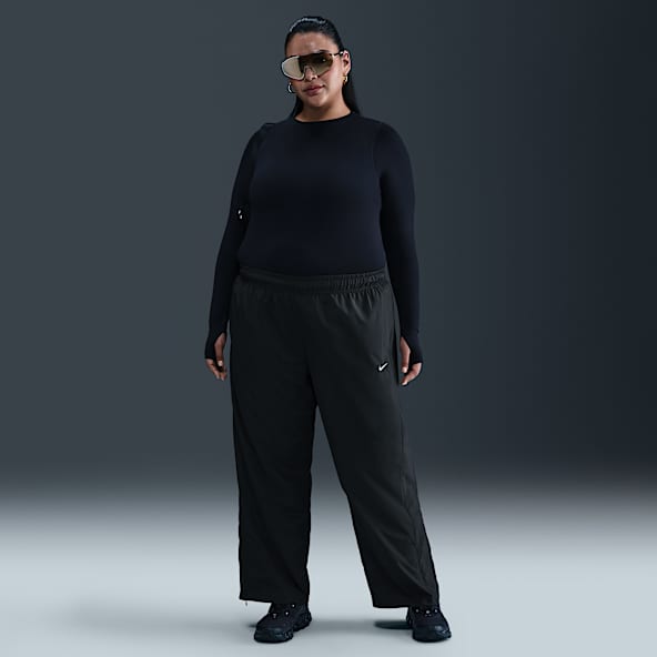 Nike Sportswear Classic Pantalones de tiro medio con dobladillo abierto para mujer (talla grande)