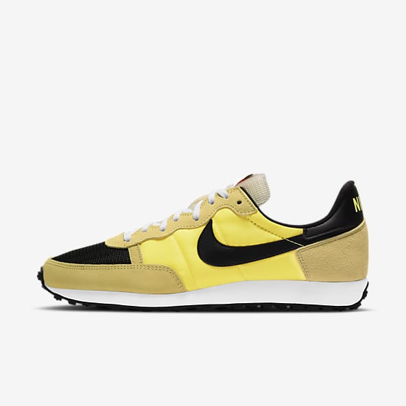 yellow black nike shoes