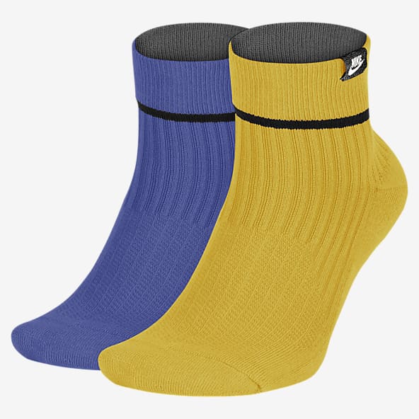 white and yellow nike socks