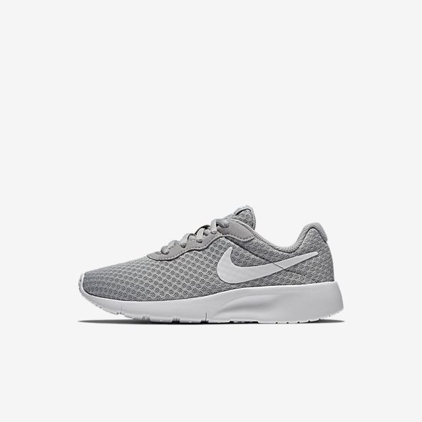 kids black nike shoes