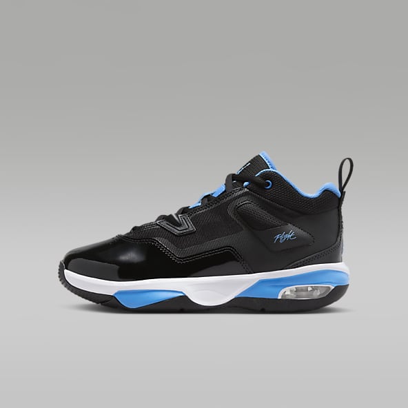 Kids black on sale nike shoes
