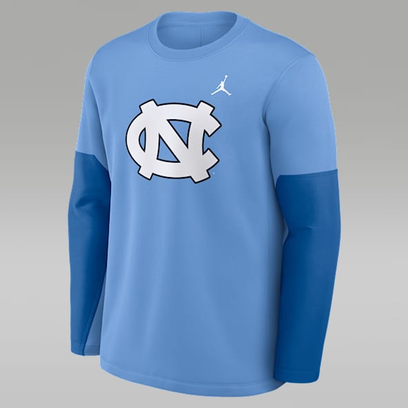 North Carolina Sideline Coach Playera de manga larga universitaria marca Jordan Therma-FIT para hombre