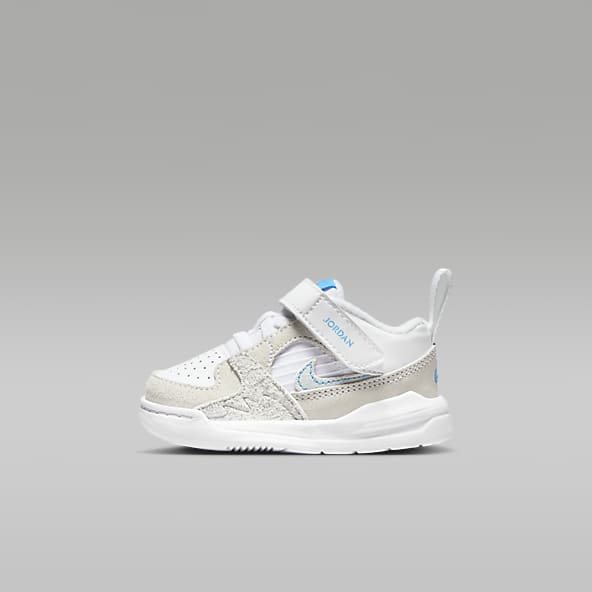 Baby white top nike trainers