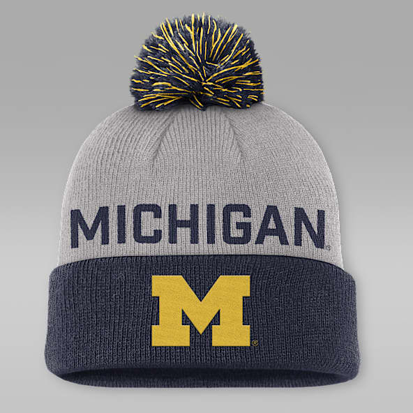 Michigan Primetime Peak Gorro universitario con pompón y puño marca Jordan para hombre