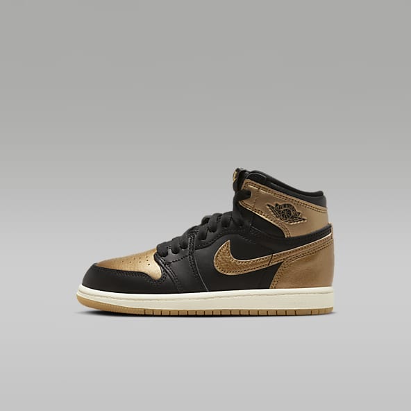 Boys gold nike shoes deals