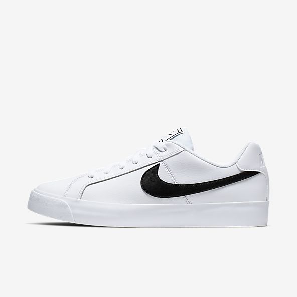 white nike shoes with black tick