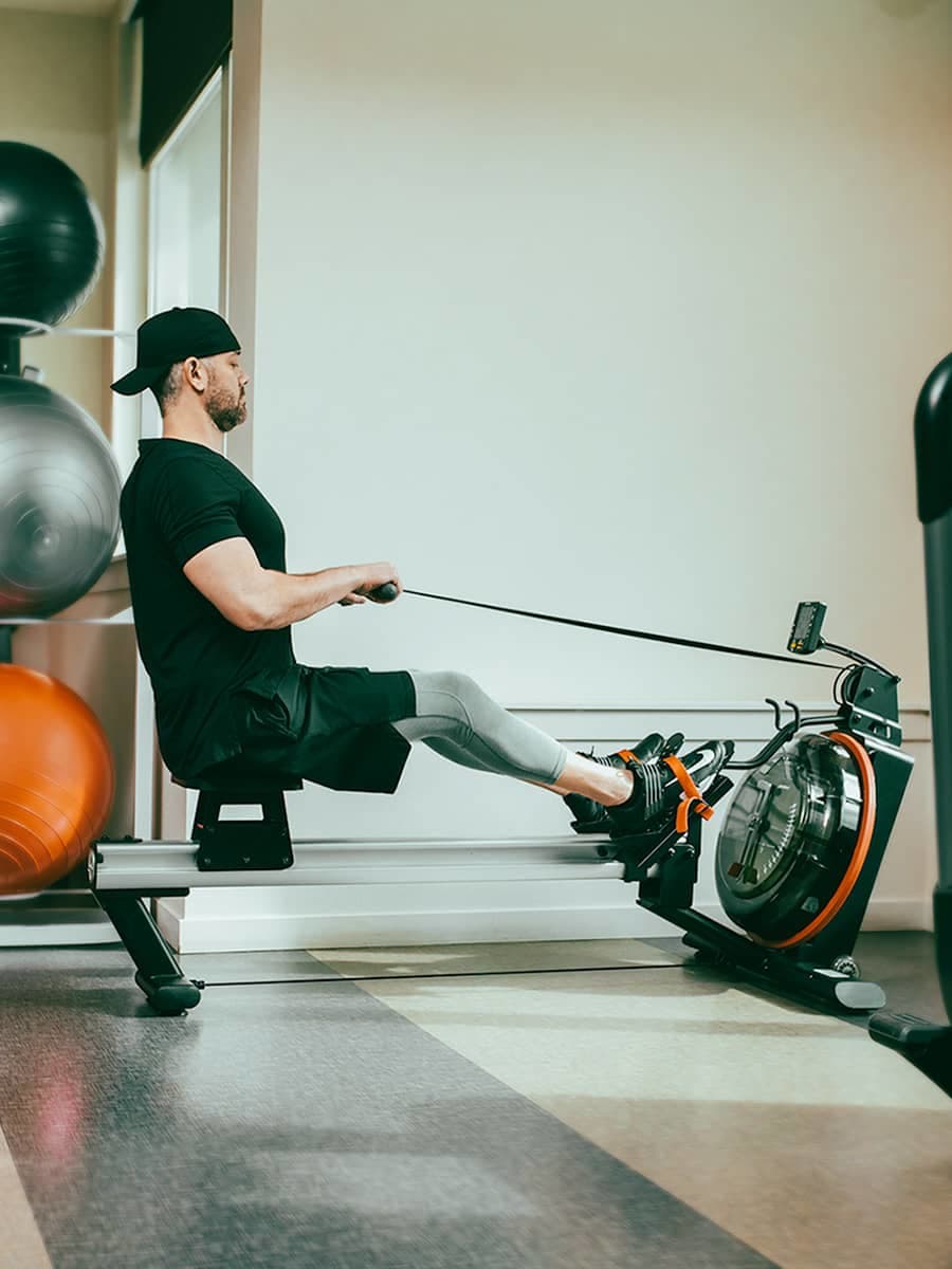 5 Benefits of Using a Rowing Machine, According to Experts