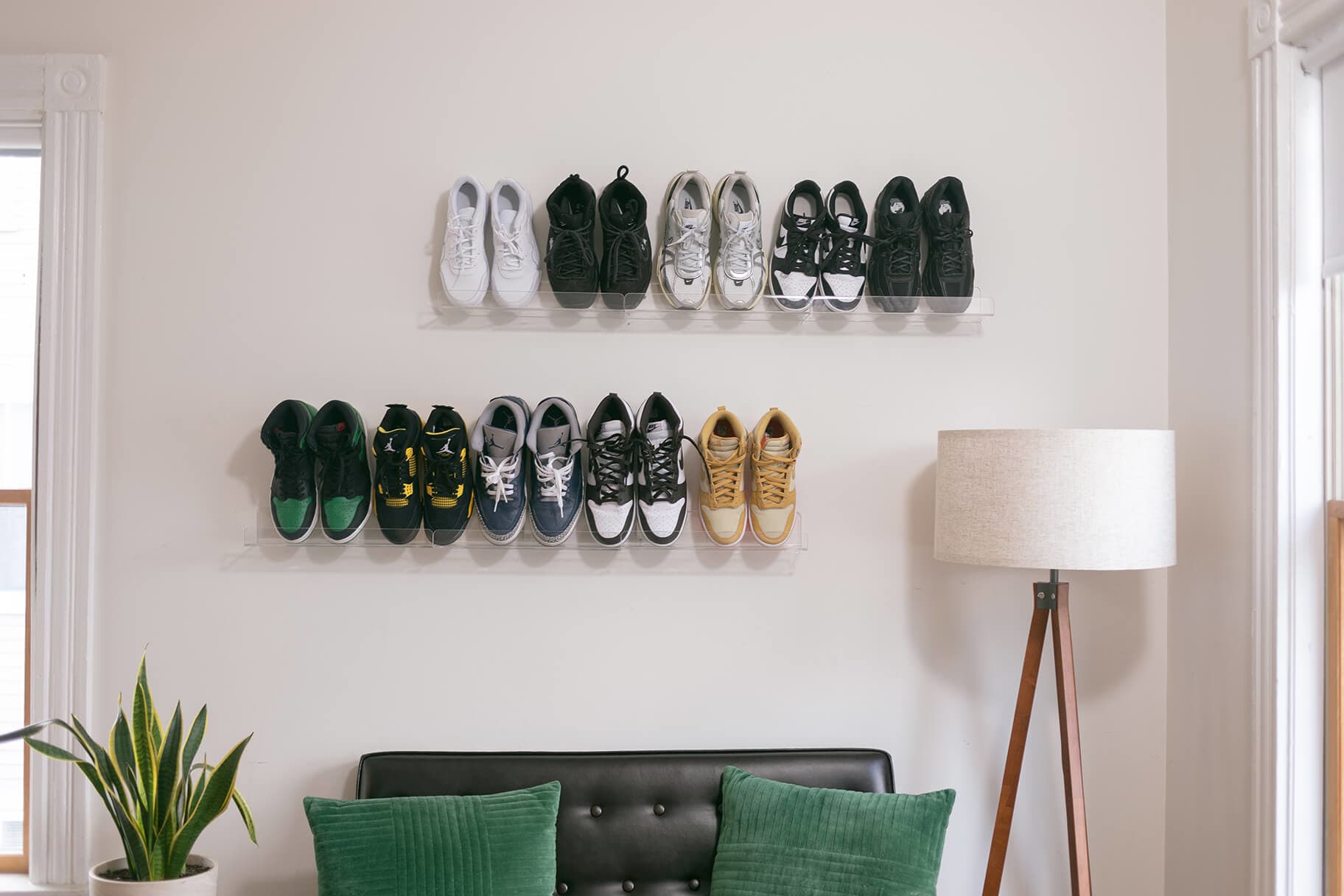 Minimalist wall-mounted shoe rack helps store footwear while