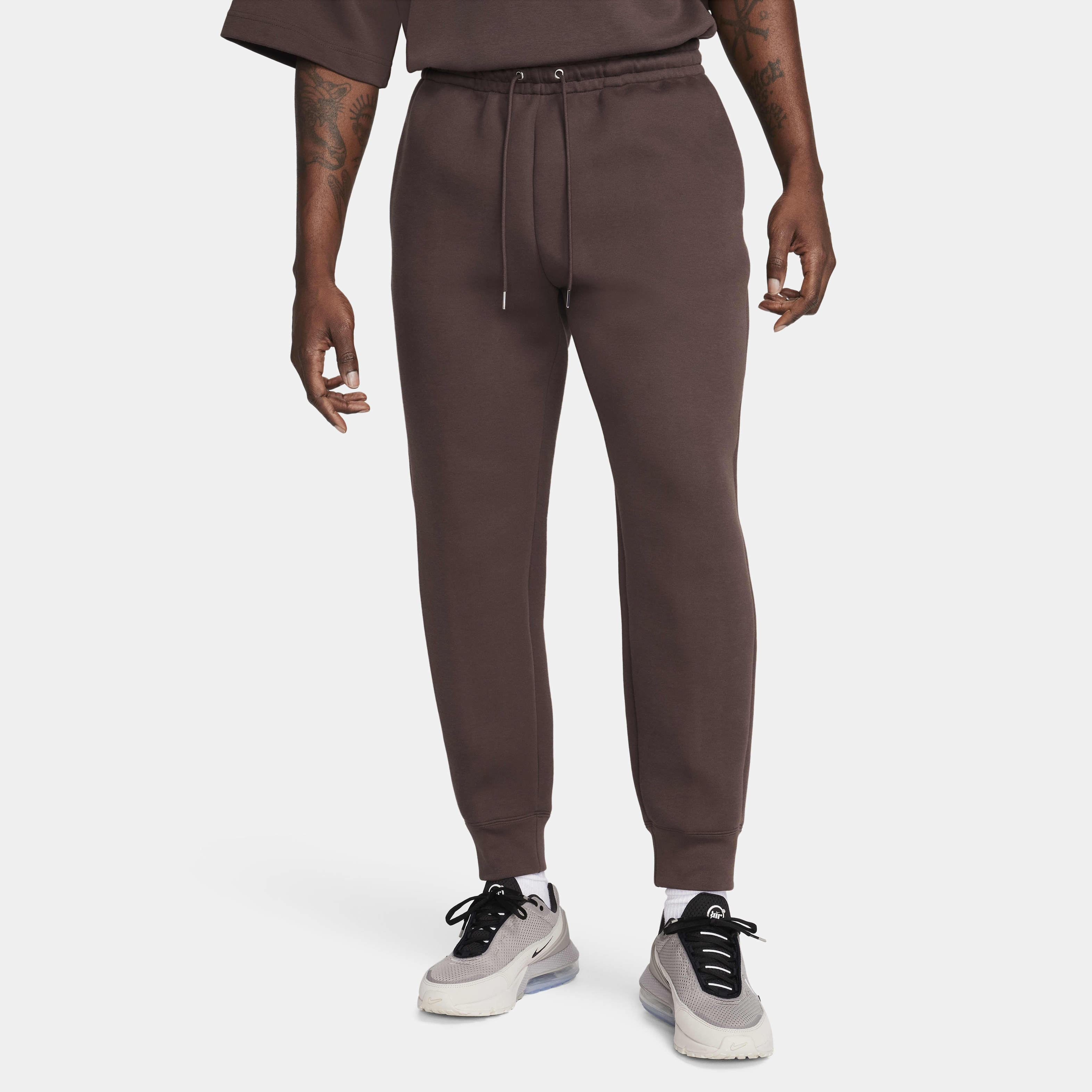 Calças de lã cardada Nike Tech Fleece Reimagined para homem