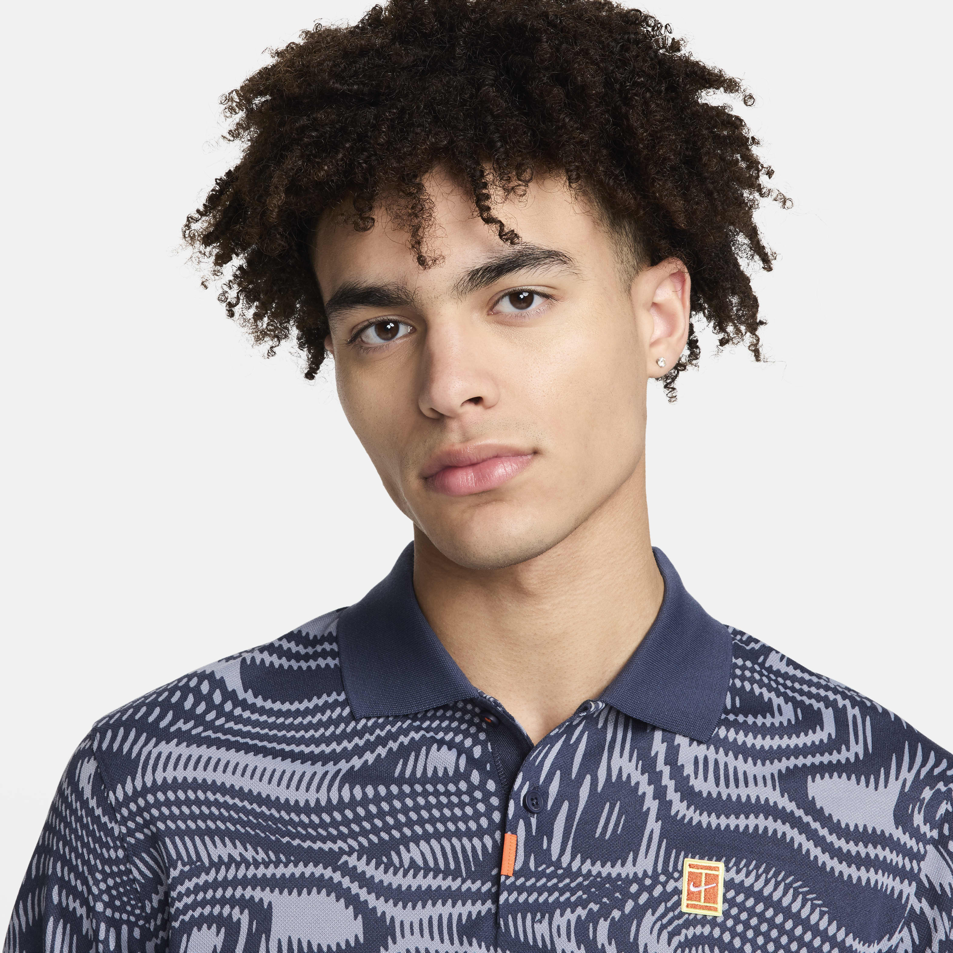 The Nike Polo Heritage Men's Dri-FIT Tennis