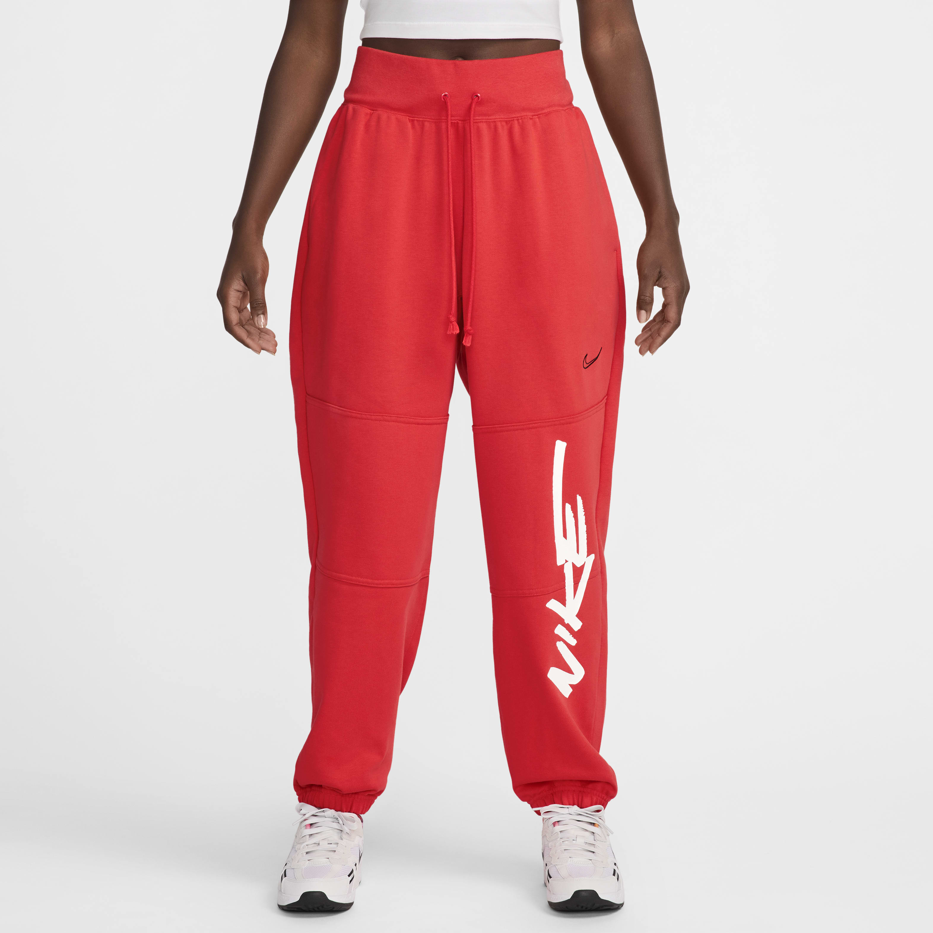 Calças folgadas em tecido moletão e com cintura normal Nike Sportswear Breaking para mulher