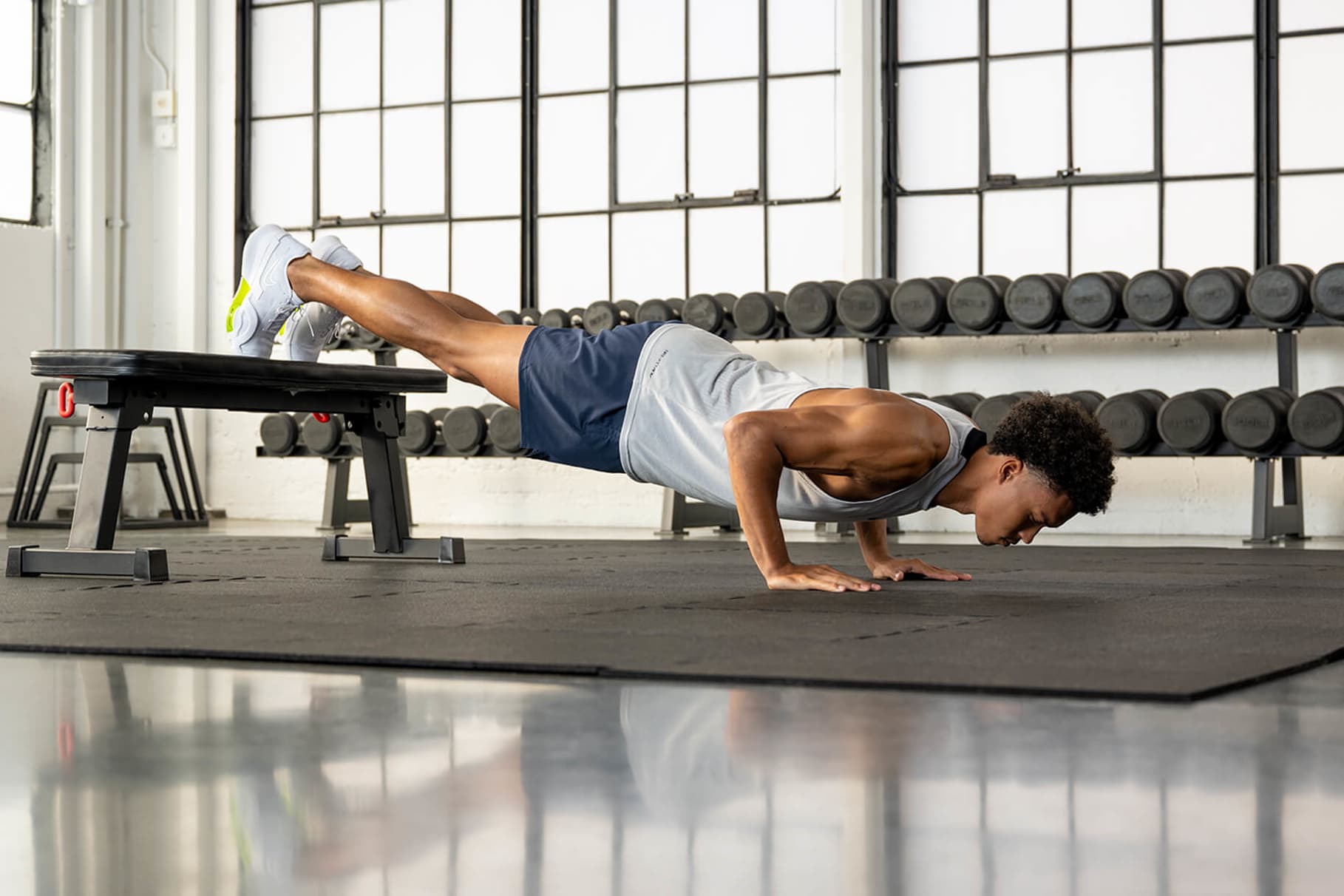 How To Do a Handstand Pushup, According to CrossFit Coaches.