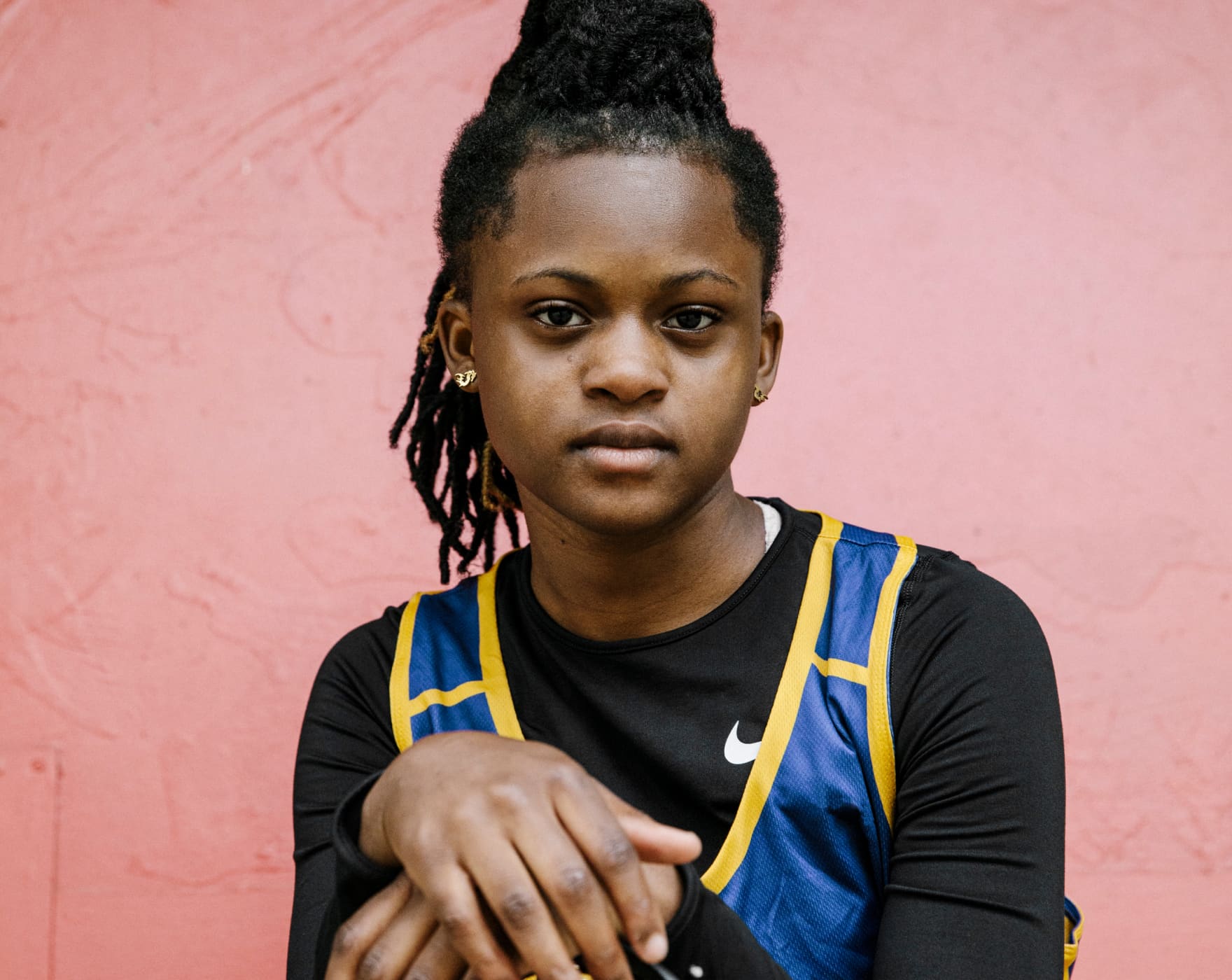Nyobi Murphy, 16
"My first time practising with Coach Jaz was a very new experience", Nyobi says. Once a defender on her school's team, she explains, "I never got criticism. It was always, 'Good job, you're doing amazing'. [Coach Jaz] was like, 'You're a great player, but …' and that was kind of a new thing for me". Now a formidable midfielder, Nyobi is grateful to her coach for teaching her to accept and learn from criticism: "I feel like she's preparing me for greatness in the future".