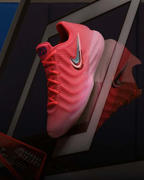 Trending Now, A pink Caitlin 1 Midnight Fever basketball shoe sits on a highly polished backboard., slide 4 of 4