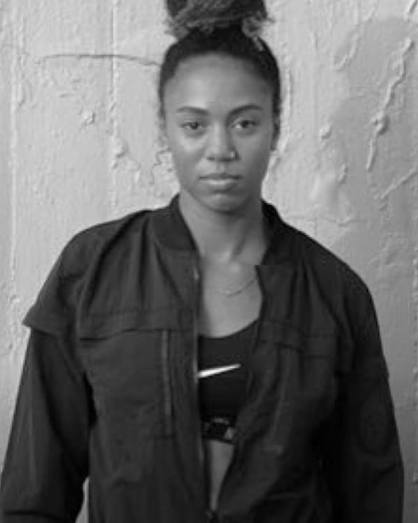 KORI CARTER, slide 2 of 3