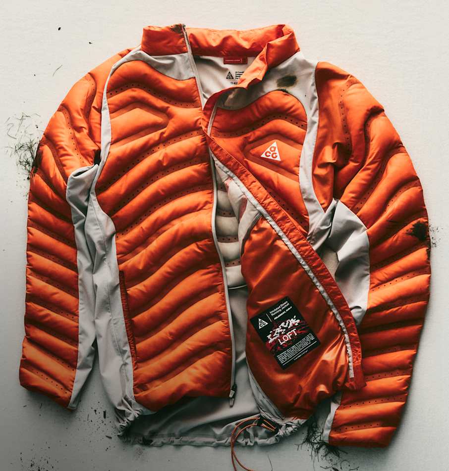 A product shot of an unzipped ACG Lava Loft jacket.