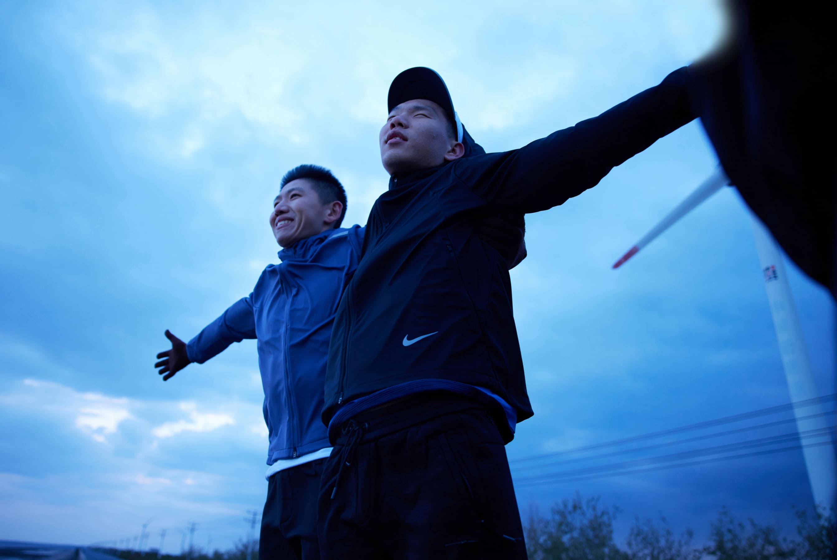 Behind some visually impaired runners are running pacers