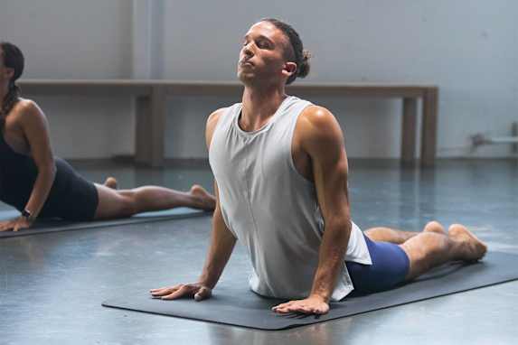 The Top 3 Yoga Poses To Get Stronger, According to Experts