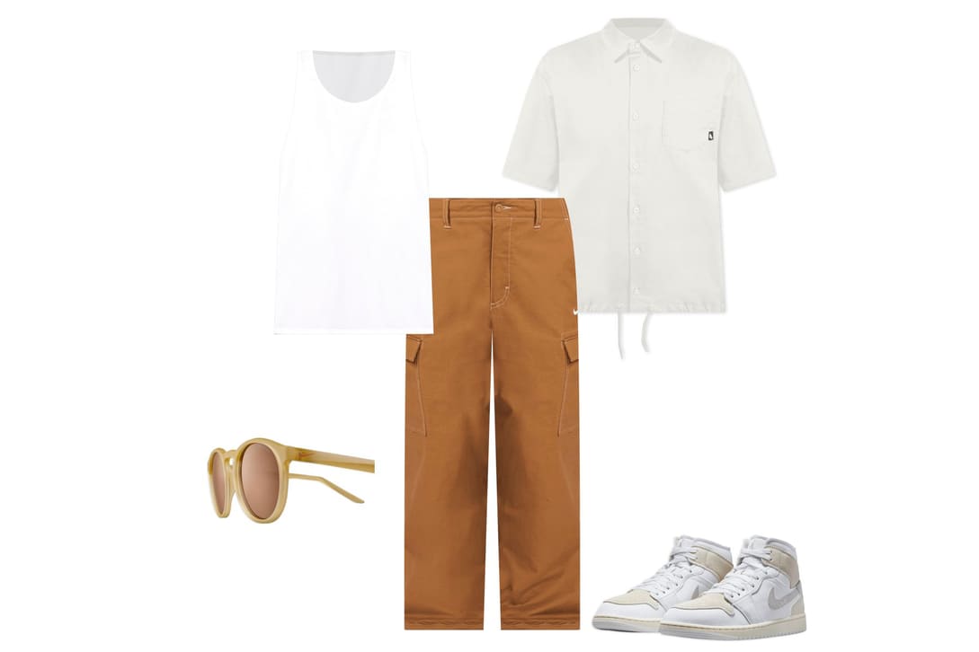 White sneakers, beige pants and black basketball jersey outfit