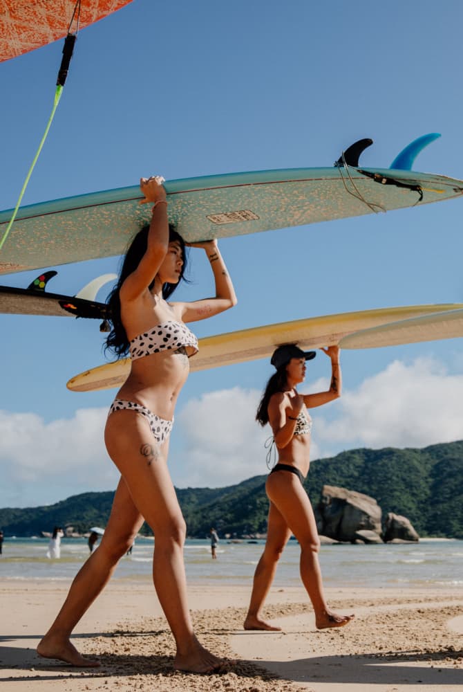 Women Surfers Making Waves in Hainan .
