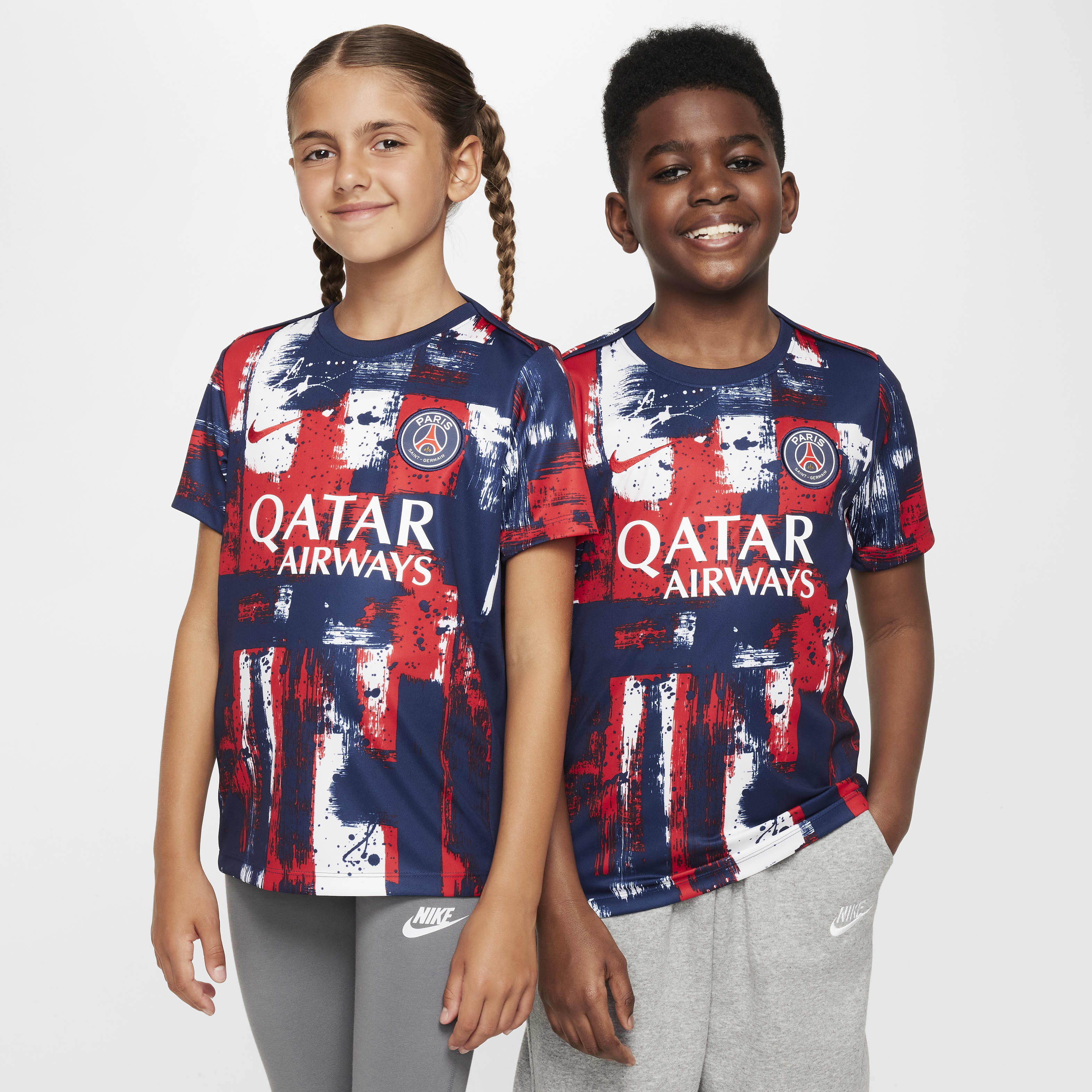 Paris Saint-Germain Academy Pro Home Big Kids' Nike Dri-FIT Soccer Pre-Match Short-Sleeve Top