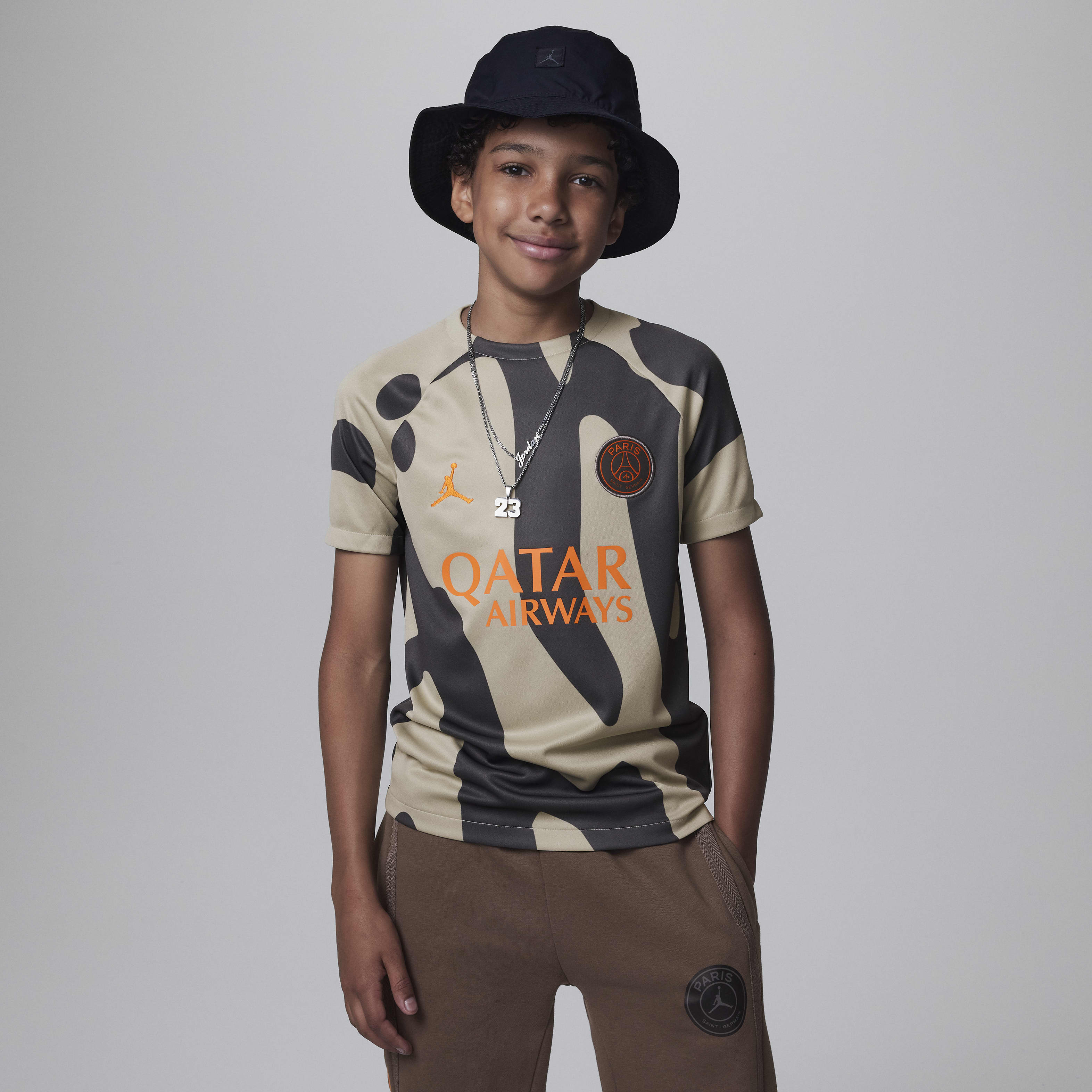 Paris Saint-Germain Academy Pro Third Big Kids' Jordan Dri-FIT Soccer Pre-Match Short-Sleeve Top