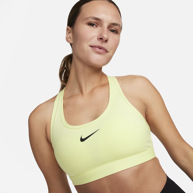 Nike Training - Nike Pro Training swoosh asymmetric sports bra in black and  yellow