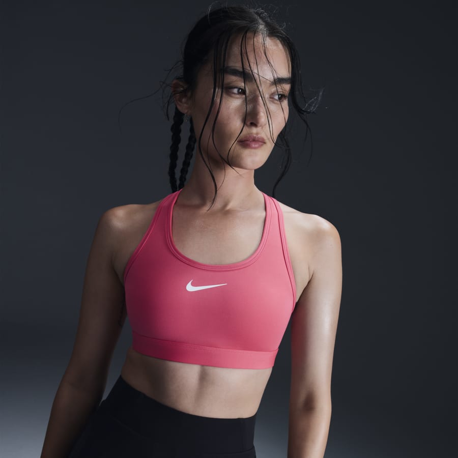 Hot pink sports bra nike clearance